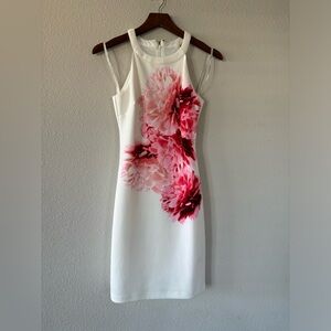 White dress with pink flowers. Guess brand size 4
